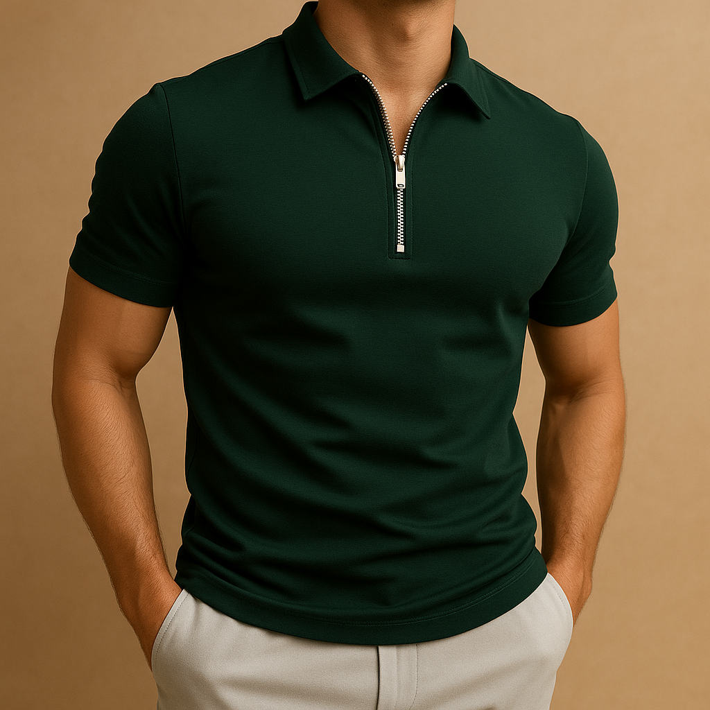 Man wearing a dark green polo shirt with a zipper on a beige background