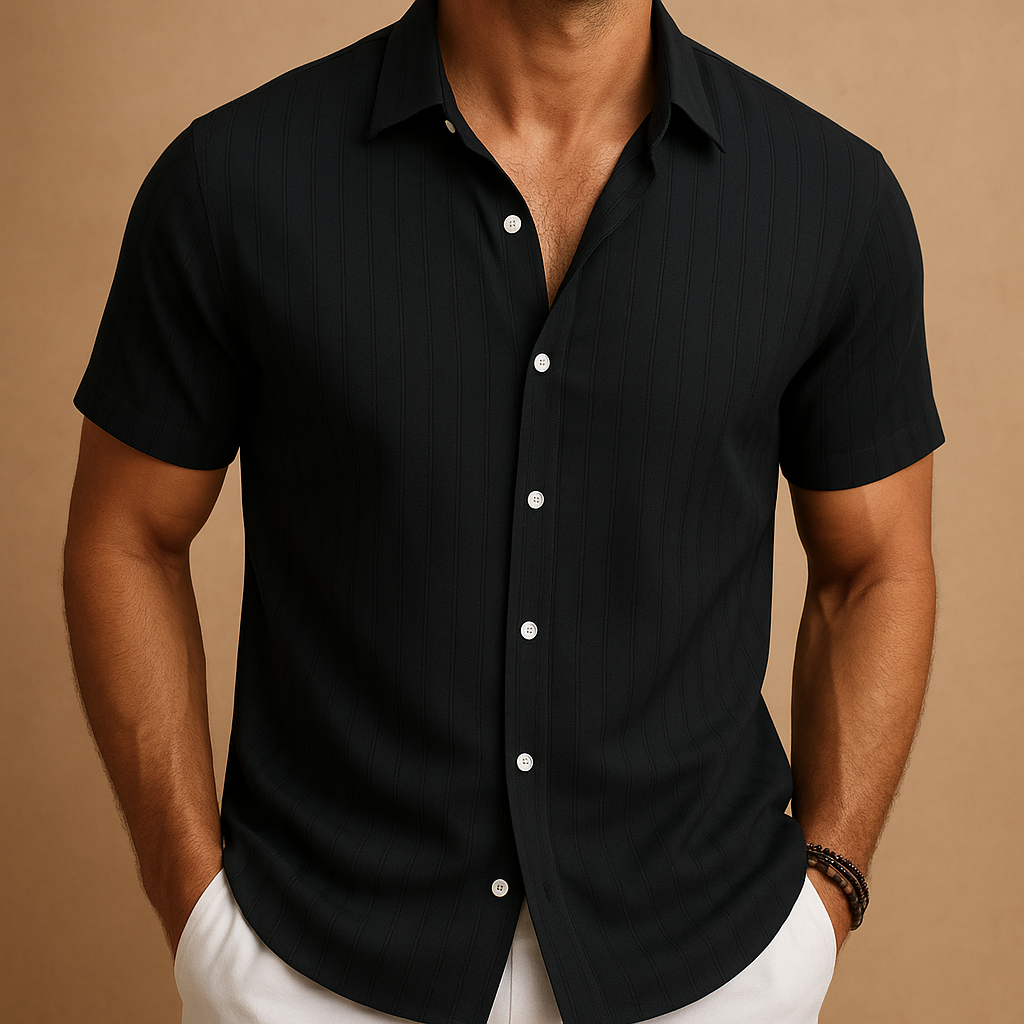Navy blue short-sleeve button-up shirt worn by a person on a brown background