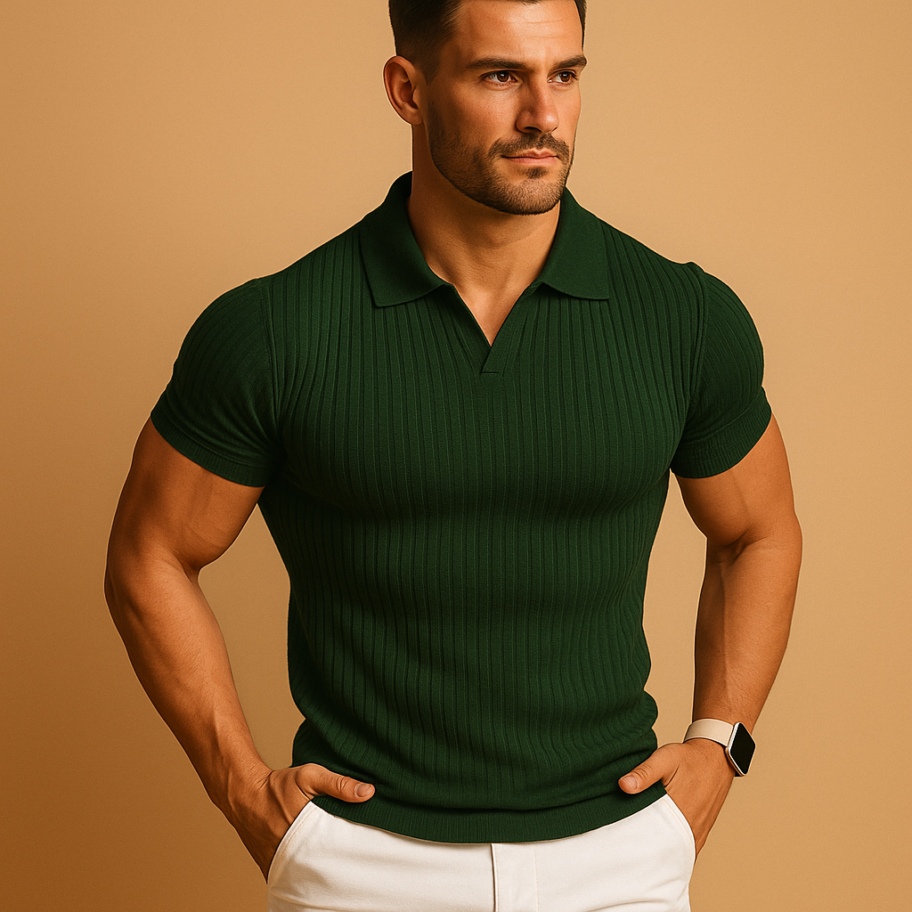 Man wearing a green ribbed polo shirt against a beige background