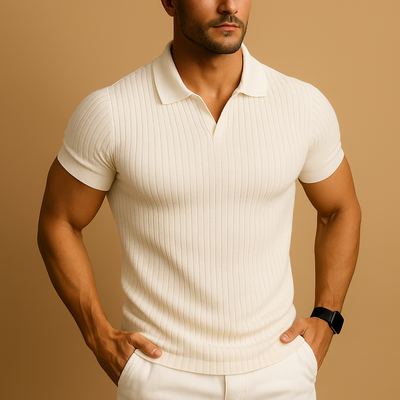 Man wearing a white ribbed polo shirt against a beige background